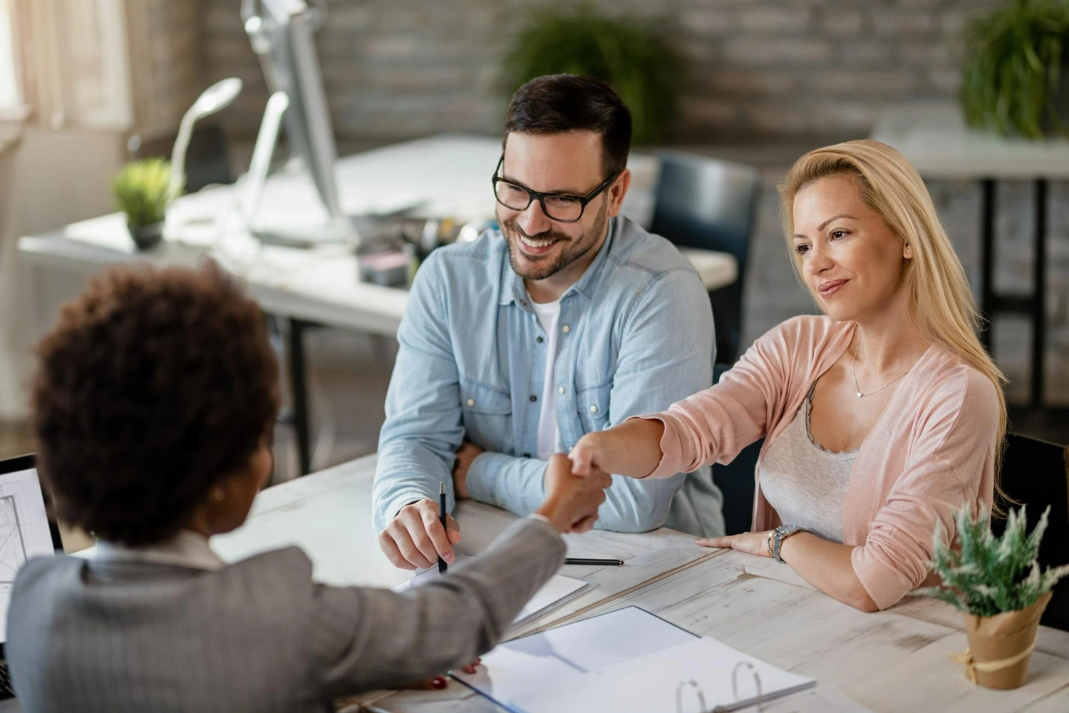 Reunião de planejamento financeiro com clientes